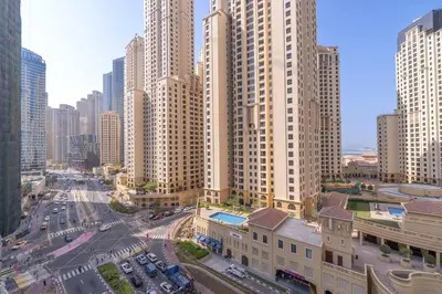 an aerial view of a city with tall buildings at NEW Listing - Czechin - JBR Beach a Few Steps Away in Dubai