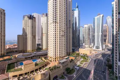 an aerial view of a city with tall buildings at NEW Listing - Czechin - JBR Beach a Few Steps Away in Dubai