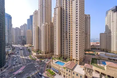 an aerial view of a city with tall buildings at NEW Listing - Czechin - JBR Beach a Few Steps Away in Dubai