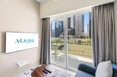 a room with a large window with a view of a city at Aliving Exclusive 1BR Reva Residence Business Bay-218 in Dubai