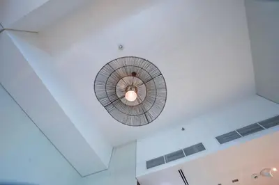 a ceiling with a spiral light in a room at Elegant 1bedroom in J ONE in Dubai