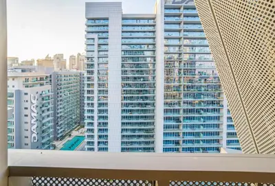 a view of a tall building from a balcony at New Arabian 2 Bedroom J One Tower Business Bay in Dubai