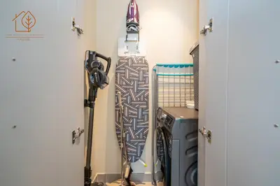 a snowboard is hanging on a wall in a room at Amazing One Bedroom Apartment in Downtown Dubai 167FO2-1 in Dubai