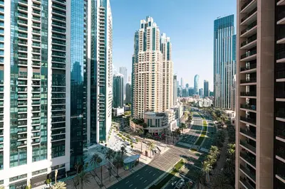 an aerial view of a city with tall buildings at Magnificent Cozy 2BR in Downtown Dubai in Dubai