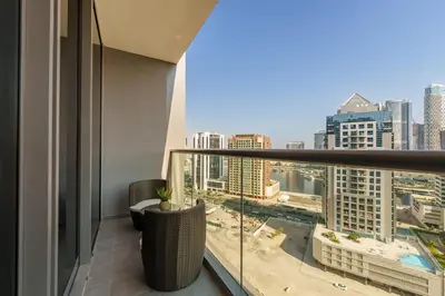 a balcony with a view of a city at Business Bay Exquisite Living Experience-Suiteable in Dubai
