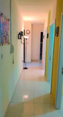 a hallway with a glass floor in a room at Wow Partition Room In Barsha 1 Near MOE Metro in Dubai
