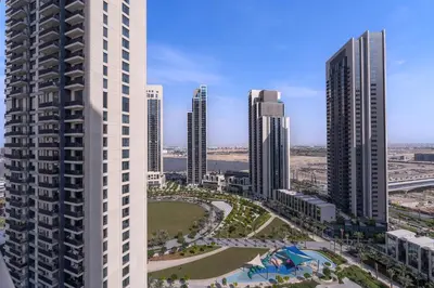 an aerial view of a city with tall buildings at Elegant apartment in Dubai Creek Harbour in Dubai