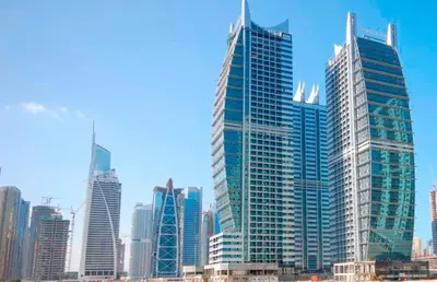 a group of tall buildings in a large city at Armada Avenue Hotel in Dubai
