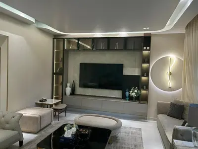 a living room with a large flat screen tv at USMANS 4BDRM APARTMENT SEA VIEW Direct BEACH Access Fully Serviced JBR in Dubai