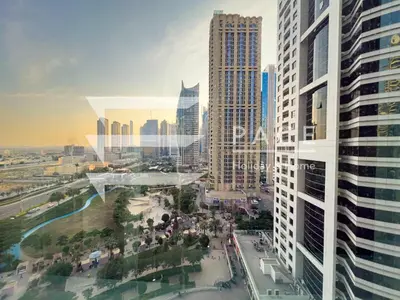 an aerial view of a city with tall buildings at 1 Bedroom Apartment in JLT in Dubai