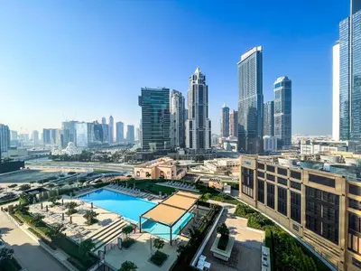 a view of a city skyline with a pool at Amazing Apartment with City Views in Downtown 164BC-2 in Dubai