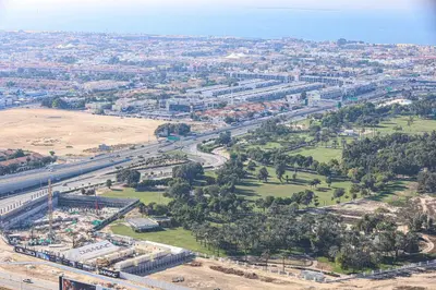 an aerial view of a city with a highway at Visionary Vista: 2BR Al Habtoor City in Dubai
