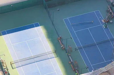 an overhead view of a tennis court at Visionary Vista: 2BR Al Habtoor City in Dubai