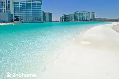 a view of the beach in front of the city at 2ndHome - District One Residences , Residence 14 in Dubai