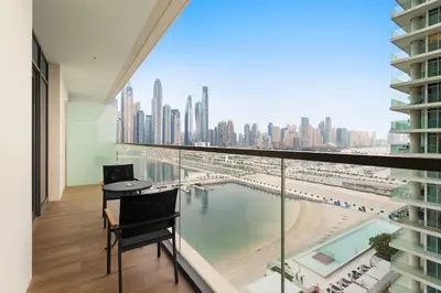 a balcony with a view of a city at Silkhaus Beach Lovers 1BDR with Marina View in Dubai