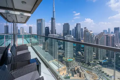 a view of a city from the top of a building at Stylish 2BR Retreat Wi-Fi & Pool Access in Dubai