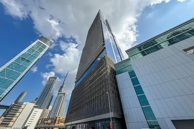 a group of tall buildings in a city at Stylish 2BR Retreat Wi-Fi & Pool Access in Dubai
