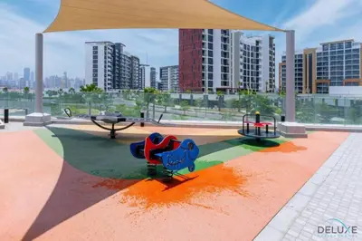 a park with a pavilion with a bench and a table at Sizeable 1BR at Azizi Riviera 35, Al Merkadh by Deluxe Holiday Homes in Dubai