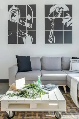 a living room with a couch and a coffee table at Frank Porter - Marina Views Tower B in Dubai