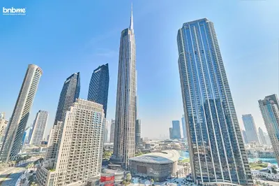 a group of tall buildings in a city at bnbmehomes - Forte in Dubai