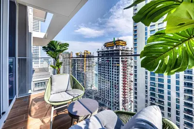 a balcony with a view of a city at Pleasant 1BD apartment with the beach access in Dubai