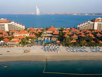 an aerial view of a resort on the beach at Elegant 1BR Full Palm View Apartment at 5 Star Resort in Dubai