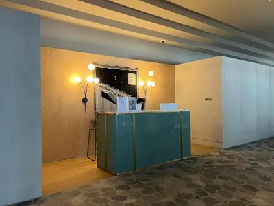 a room with a blue counter and a mirror at UPSIDE LIVING Downtown Business & Leisure in Dubai