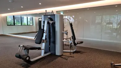 a gym with cardio equipment in a room at Ahad Residence Walking Distance to Dubai Mall in Dubai