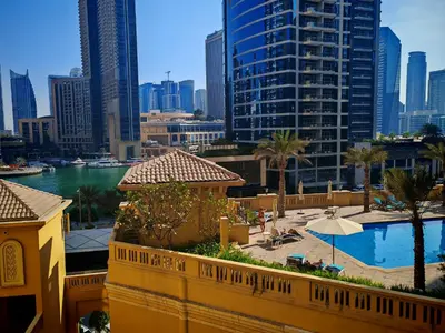 a view of the city from the balcony of a hotel at Spacious 2BR Apt on JBR Beach near Mall & Metro By La Buena Vida Holiday Homes in Dubai