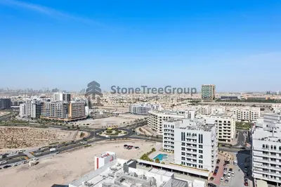 an aerial view of a city with tall buildings at StoneTree - Brand New Studio in Jewelz Residence in Dubai