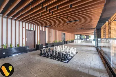 a large room with a chess board in the middle at Vogue Business Bay, Bayz By Danube close to Downtown, Dubai Mall and Burj Khalifa, Three Bedroom Apartment with Balcony and Burj Khalifa view, Access to all Amenities in Dubai