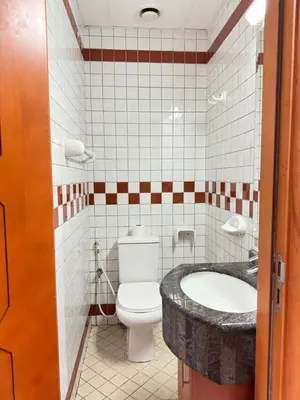 a bathroom with a toilet and a sink at Dream Tower 1 in Dubai