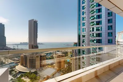 a view of the city from the balcony of a building at Botanica Tower - Bright One Bedroom in Dubai