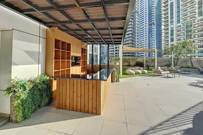 a lobby with a view of a building at Botanica Tower - Bright One Bedroom in Dubai