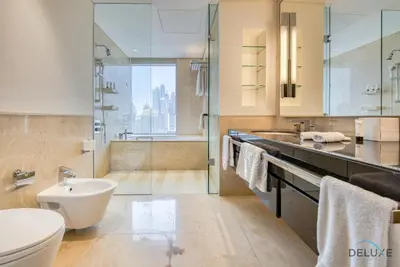 a bathroom with a sink toilet and a shower at Posh 1BR at The Address Residences Dubai Marina by Deluxe Holiday Homes in Dubai