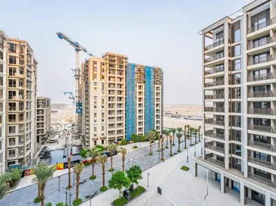an overhead view of a city with tall buildings at Coastal Charm Casita : 1BR Creek Beach Elegance in Dubai