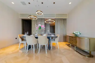 a dining room with a table and chairs at *Five Palm* 2bdr Private Beach in Dubai