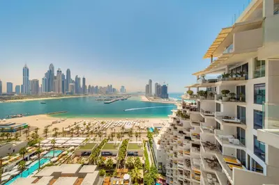 a view of the beach from a building with a beach and buildings at *Five Palm* 2bdr Private Beach in Dubai