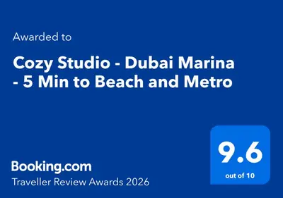 a screenshot of a cell phone with the wordsocoby studio dubral marina at Cozy Studio - Dubai Marina - 5 Min to Beach and Metro in Dubai