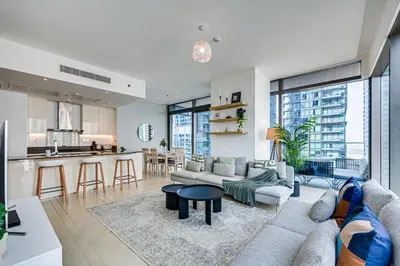 a living room with a couch and a table at Luxurious apartment in Dubai Marina in Dubai