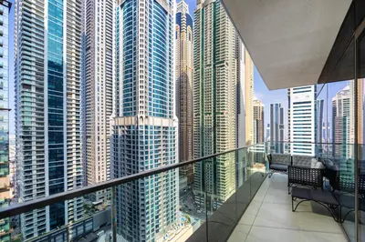 a balcony with a view of a large city at Luxurious apartment in Dubai Marina in Dubai