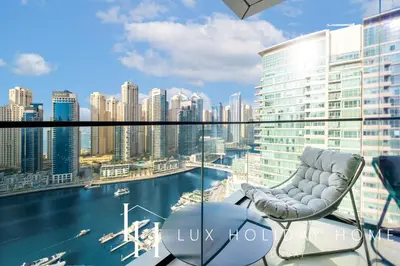 a balcony with a view of a city at LUX The Vida Marina Residence 3 in Dubai