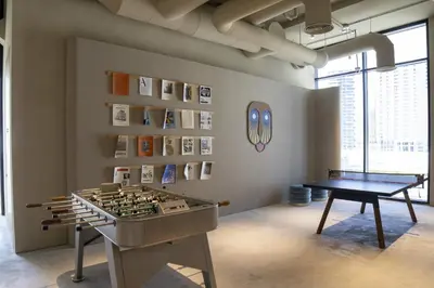 a room with a chess board and a table in it at Studio with Burj Khalifa View - Upside Living in Dubai
