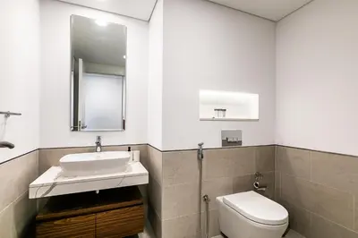 a bathroom with a sink and a toilet at Apartment 1BDR in Madinat Jumeirah I Asayel 3 in Dubai