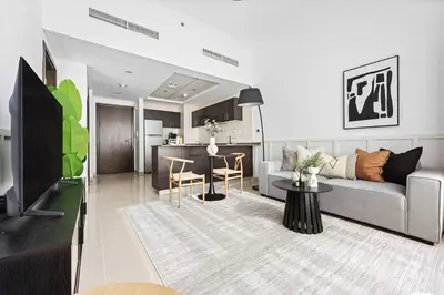 a living room with a couch and a table at Silkhaus in Dubai Marina Heart, Opposite to Marina Mall in Dubai