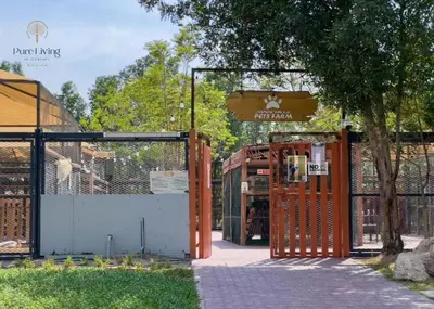 a gate to a zoo with a fence and a gate at Damac Hills Carson C studio with full kitchenet - Ideal for monthly stay in Dubai
