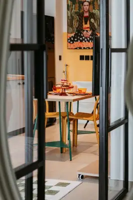 a dining room with a table and chairs in a room at Coolest 1 BR in Dubai Hills close to the Park in Dubai