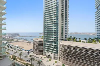 an aerial view of a city with tall buildings at Silkhaus Sea View 1BDR Luxurious New Tower in Dubai
