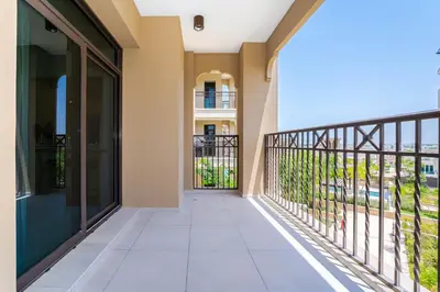 a balcony of a house with a view at Peaceful 2BR Retreat Near Burj Al Arab in Dubai