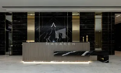 a building with a maseren sign in front of it at Stylish 1br Business Bay W Burj Views in Dubai